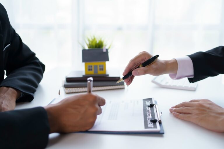 home buyer and home seller negotiating on a new home contract