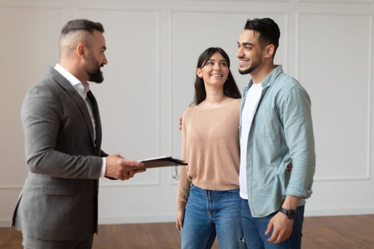 Realtor convincing the couple to consider his service when they ask for how to sell a house by owner