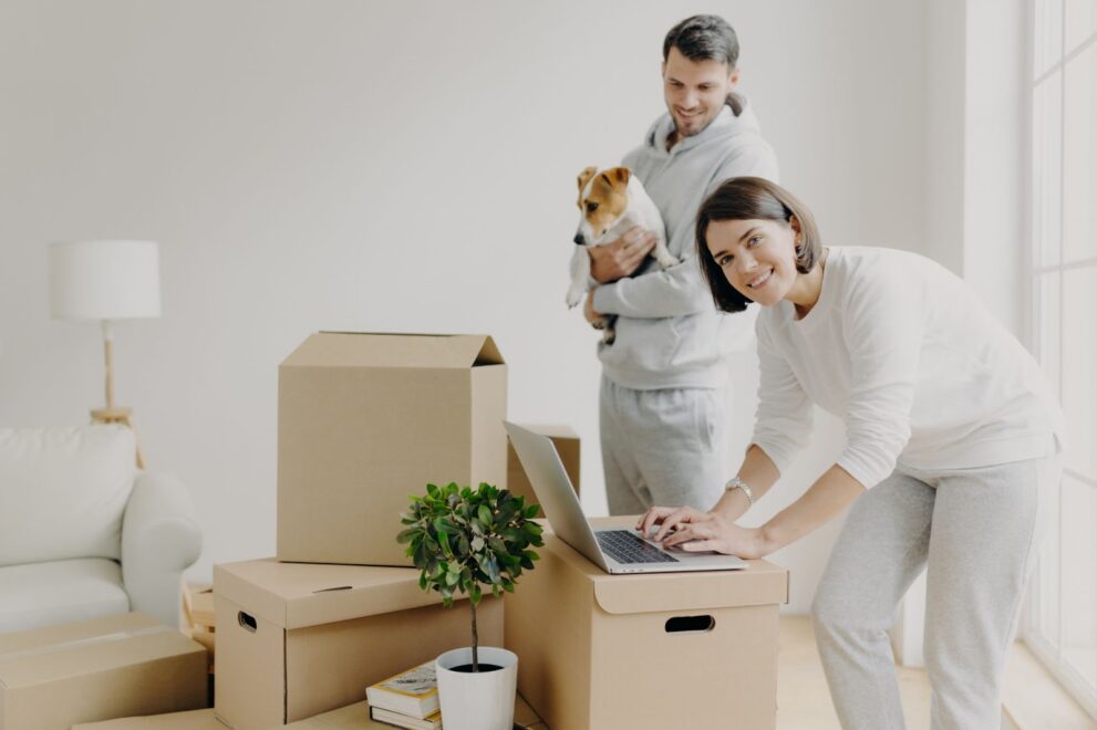 Home buyers moving in into the house and unboxing